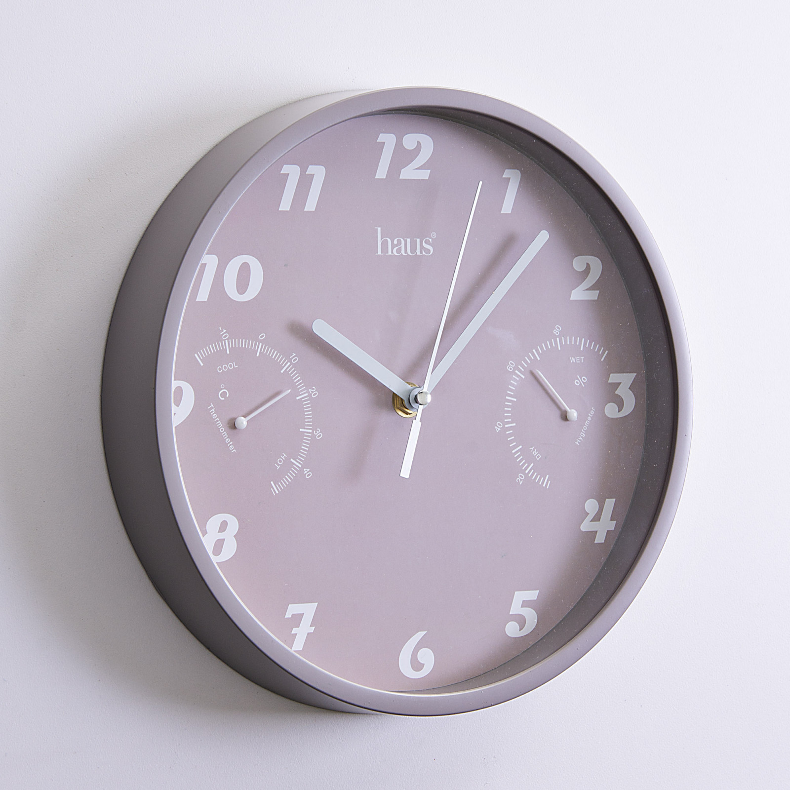 Reloj con termometro higrometro Haus elaborado en plastico