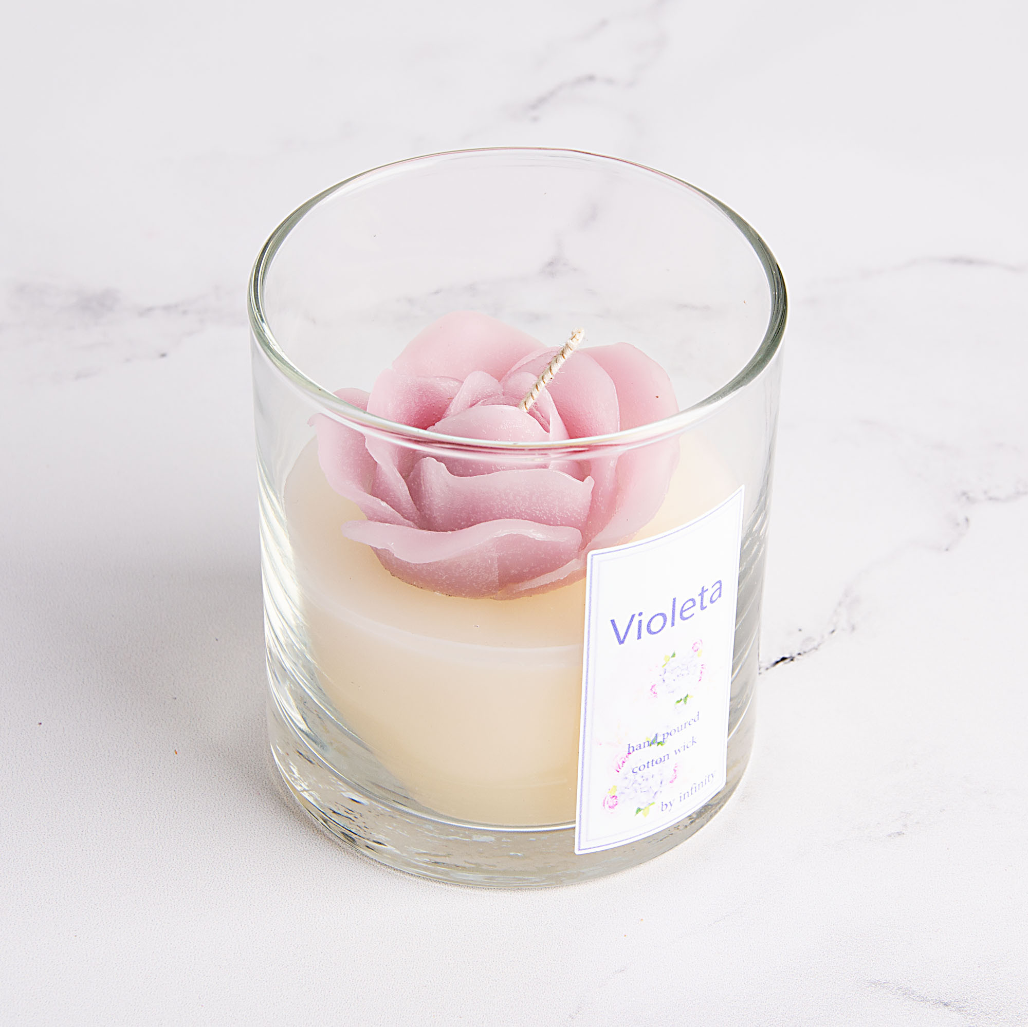 Vela vaso flor con aroma a violeta.